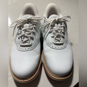 Skechers golf shoes. Saddle type. White with a little pink. Size 6 -waterproof